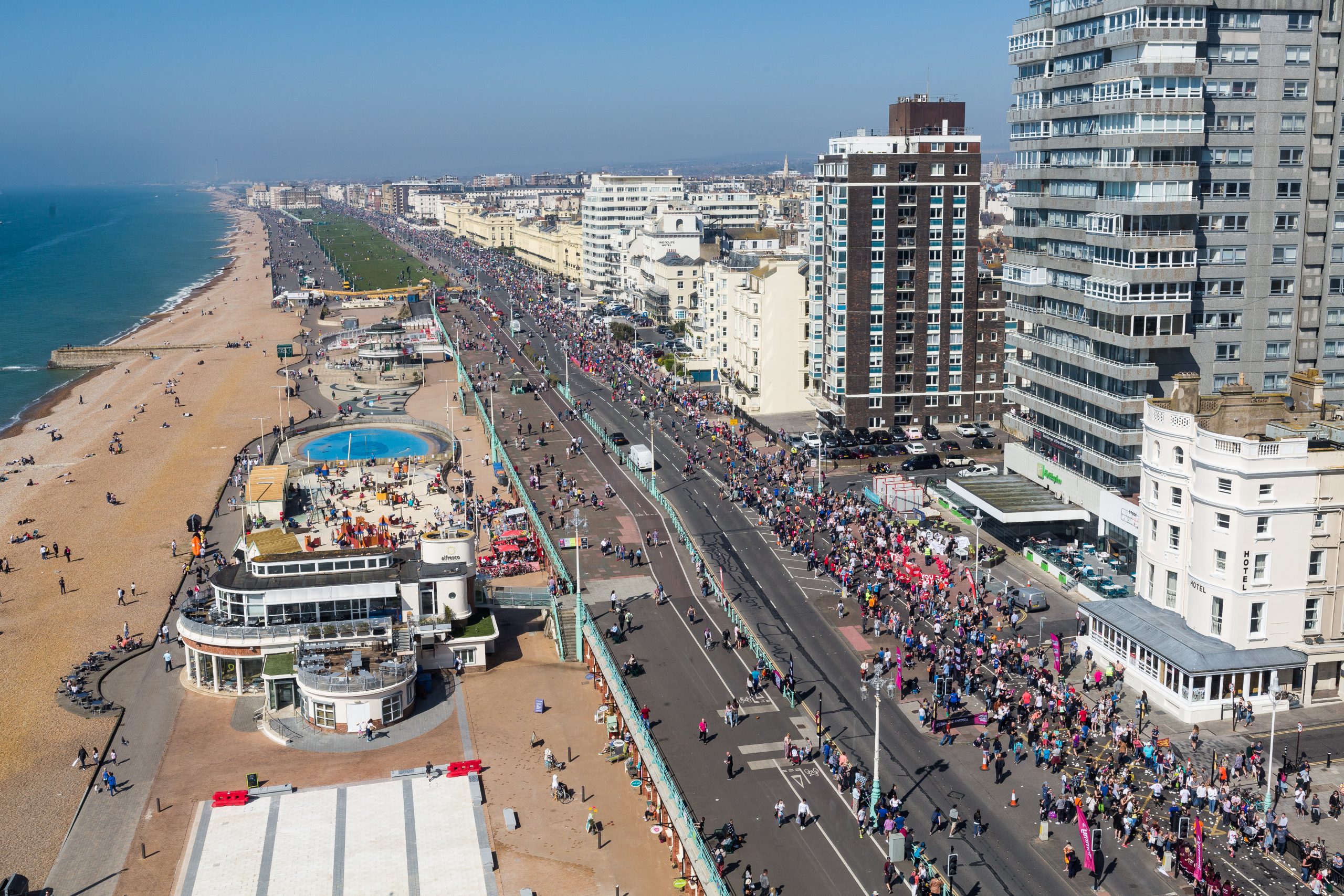 Aerial view of half marathon across beach